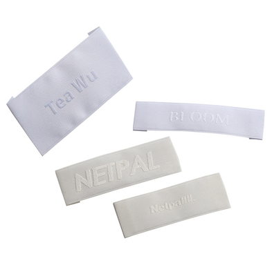 Un bon prix. Le tissu fait sur commande de satin de damassé de satin de label tissé par satin marque les labels tissés de satin de bord en ligne