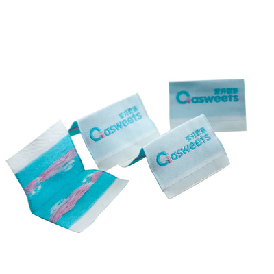 Un bon prix. Les labels faits sur commande d'habillement cousent sur les labels tissés de pli central font une boucle plient les labels tissés en ligne